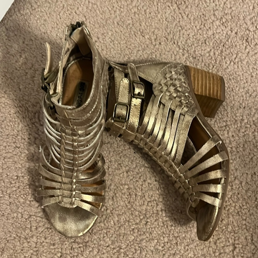 Gold low block heels